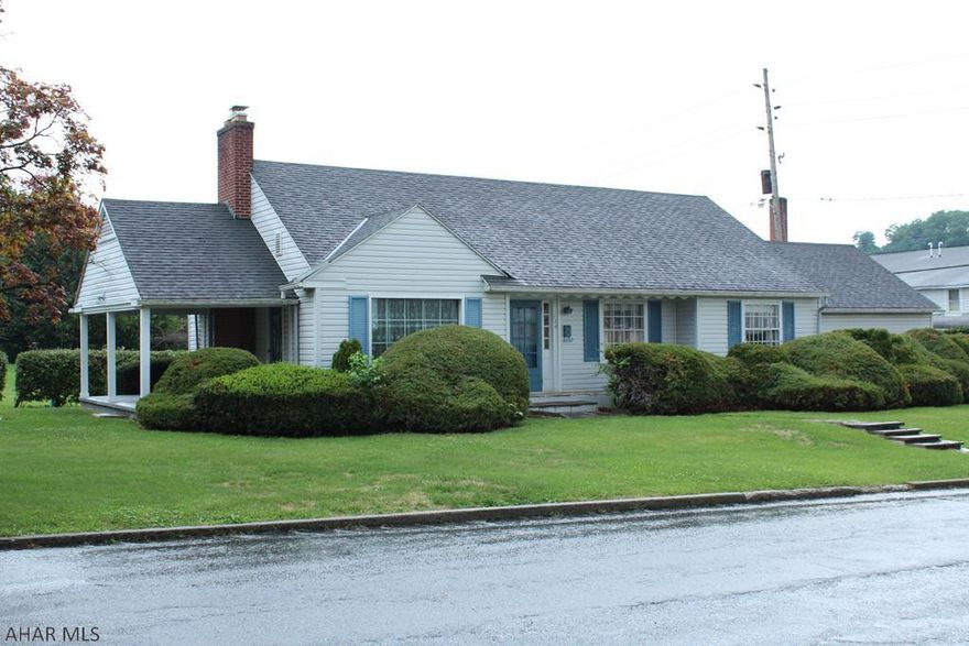 So much potential in this charming, well-built and well-maintained cape cod on a corner lot on a quiet street in the borough.  Features a lovely covered side-porch, lots of built-ins, gas fireplace, laundry chute, new central A/C system and hardwood floors throughout.  Storage is no problem with the full basement and two 2-car garages.