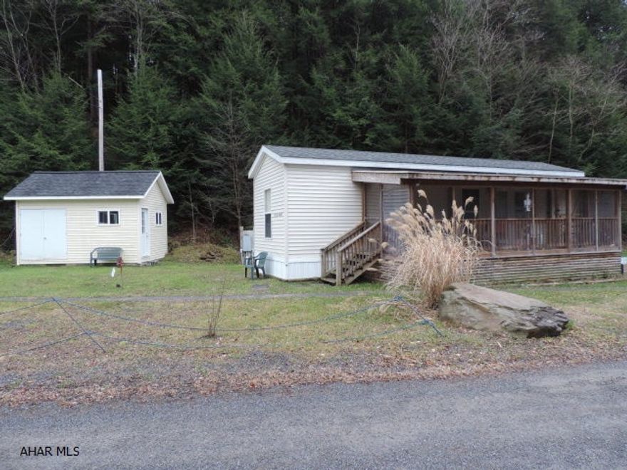 2009 Park Model camper inside Glendale Yearound. This park model has been well maintained and is in very good condition. One bed and bath with kitchen and living room. All utilities are hooked up and in such a way that it is usable all year long. There is a covered porch and a shed on the property as well. The shed has been insulated and has electric inside. Could be used as a small workshop. The park model is located near the end of North Locust Lane which gives it a little more privacy than most campsites. There are two lots with this property.