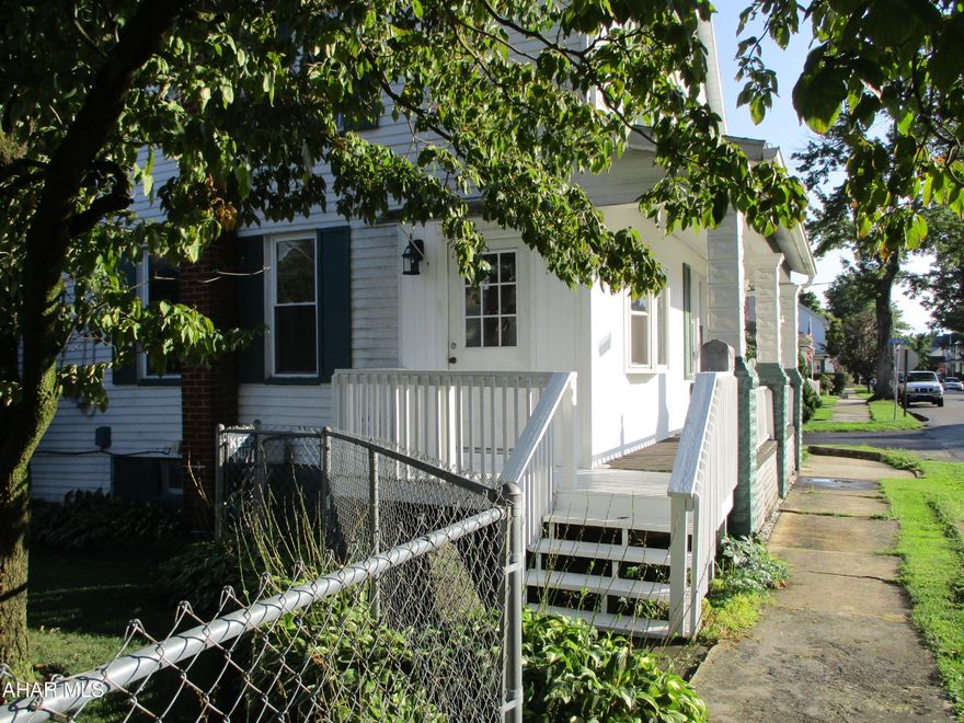 Lovely corner home on quiet Bellwood Street.  Spacious living area, eat in kitchen, three bedrooms.  Gracious front porch and private covered patio in back yard.  A fenced yard makes this the perfect home for owners with small children or pets.  Two car detached garage is oversized to allow for work or storage area.  New water heater in 2021.  Roof approximately 10 years old.  Bathroom enlarged in 2015 and features a jet tub plus walk in shower, front porch added in 2015.  Laundry located in bathroom,