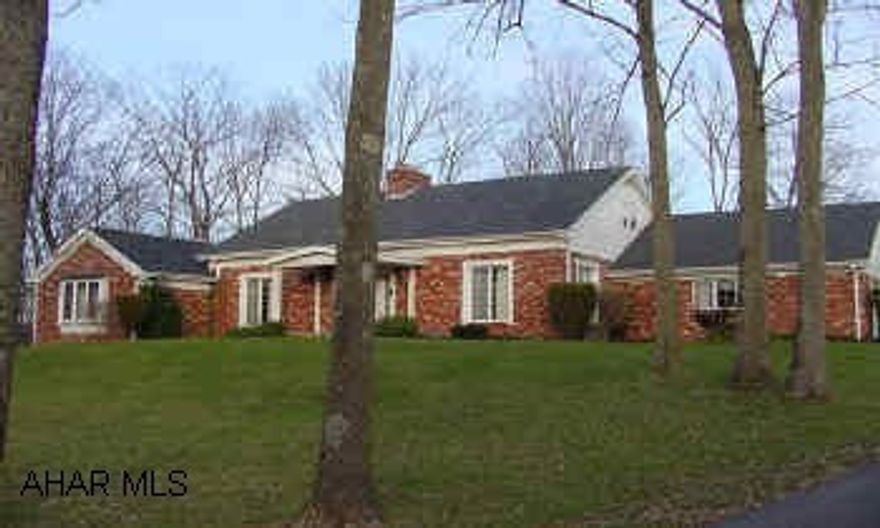 LARGE SOLID BRICK CAPE COD ON 3+ WOODED ACRES, HAS BEEN USED AS B&B. BEAUTIFUL WOODWORK THROUGHOUT, LOTS OF CLOSET SPACE AND STORAGE. BEAUTIFUL SETTING.