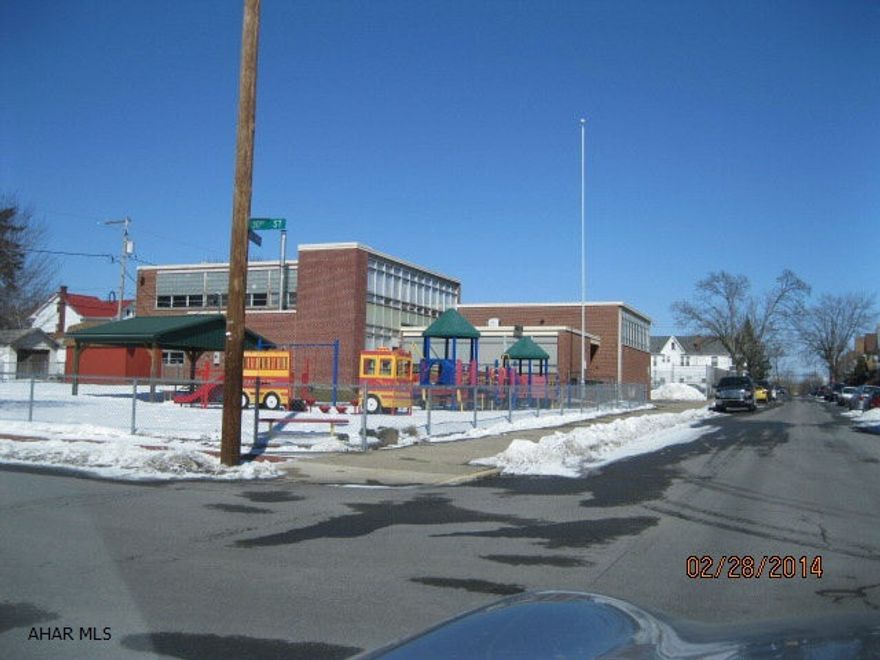 Former Curtain Elementary. 11,106 sq. ft. Lot includes full block with fencing. Assessment appeal needed.