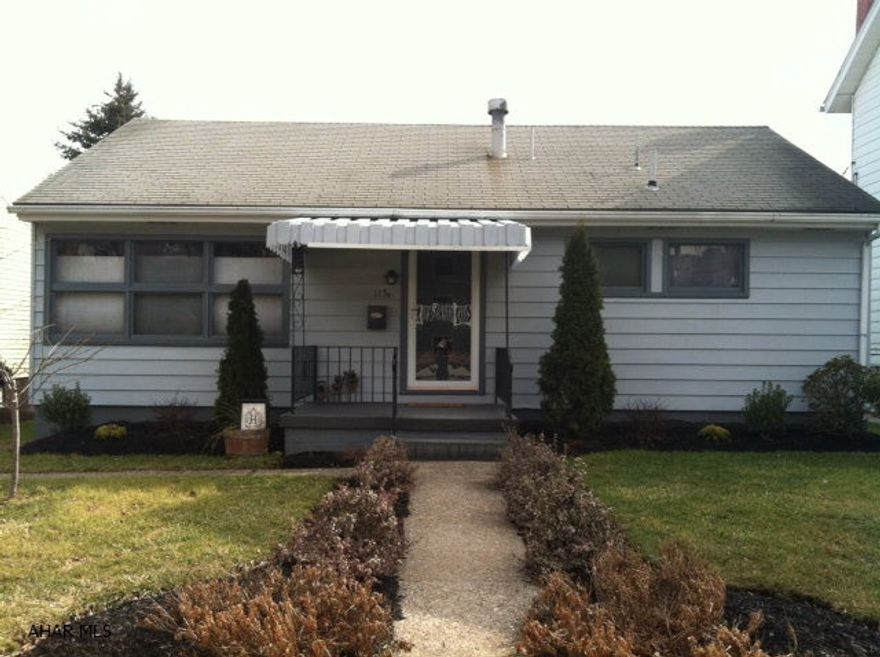 Move right in.  Large finished basement great for entertaining.  Modern kitchen & bath.  1 3/4 baths.  Fenced in yard. Covered deck. Home wired for security system. Off street parking.