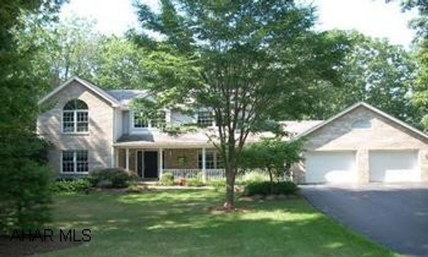 A Beauty in Regency Estates. New natural cherry hardwood floors. Lovely eat-in kitchen  w/stainless appliances that open to warm & comfortable 14x19 Family Room w/fireplace highlighted by side windows. French doors opening to large rear deck w/ hot tub and private back yard.Formal dining roomw/tray ceiling and  oversized master suite w/ jacuzzi and 2 walk in closets.  1st floor laundry room and office or toy room. 2 large recreation rooms/exerciserooms or mother - law suite on lower level. Den/office room also on lower level. Walk out lower level and entrance to addtional 2 car garage. Wonderful corner .597 lot w/wooded adjacent land. Call to see this wonderful and immaculate home. Call Dianne 814-329-1856 MOTIVATED SELLERS!