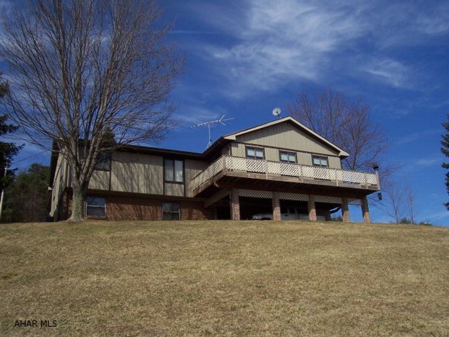 Well Maintained move-in ready, immaculate 6BD/4BA raised ranch with wrap around deck, full finished basement, new countertops,and a sunroom over looking the mountains. Detached 1 car garage and carport with a 2BD/1BA apartment/guest home suitable for family members or as a rental income. Additional 3-car garage showroom equipped with water/electric, heat,and a 1/2BA. Another 3-car garage used as a workshop,hobby shop or a business with water/electric and heat. Large barn and chicken house/storage building. A popular hunting paradise with abundance of wildlife with rolling and breathtaking views. Fun for the family or your home away from home paradise. Peaceful and quiet and only minutes to I-70 and PA Turnpike. Within 2 hrs. of Harrisburg, Baltimore, Washington and Pittsburgh.
