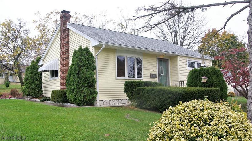 This modern quaint 2 bedroom is just adorable.   It offers an newer kitchen with Oak cabinets, Hardwood flooring, newer windows, updated appliance, and a newly remodeled full bath on main floor. This darling home also sets on a sweet corner lot with a fenced yard and covered rear patio.    The basement currently shows a man door but Garage door is still attached in the inside that can be easily converted back to integral garage.