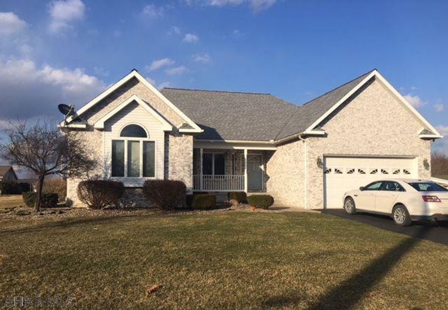 Lovely home in a quiet neighborhood. First floor has ensuite master w private patio door, master bath w granite counters, jetted tub, 3x7 shower, and 2 large walk-in closets. 2 more bedrooms on this floor along with a second full bath that boasts granite counters and a skylight. Spacious living room has marble propane fireplace and lovely hardwood floors. Open kitchen and dining room w tile floor, granite countertops, hand crafted cherry cabinets w lots of storage. Separate area for a den or office. Inviting screened-in porch off of den. Basement has a large finished rec room that is plumbed for a kitchen, 2 spacious bedrooms, full bath, utility room and lots of storage. 200 amp electric w separate panel for the basement. Hot water oil with 2 heating zones. Central air. Radon system.