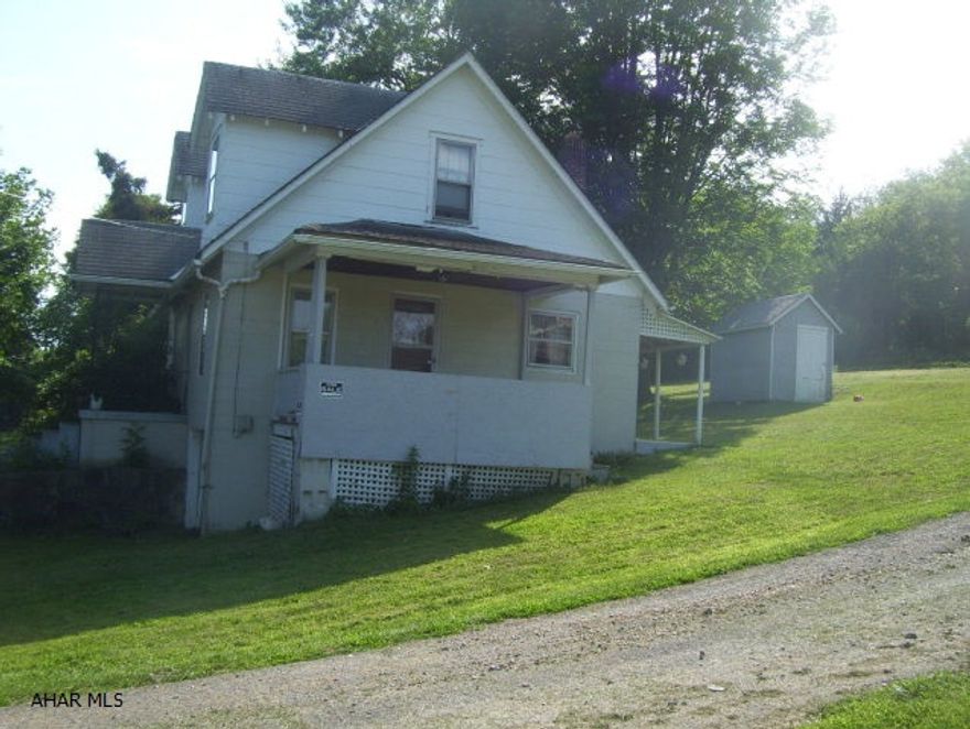 Investment or primary residence. 2 story 3BD 1BA on .8 acres. Inside shows nicely with newer kitchen.  Outside needs some repairs.