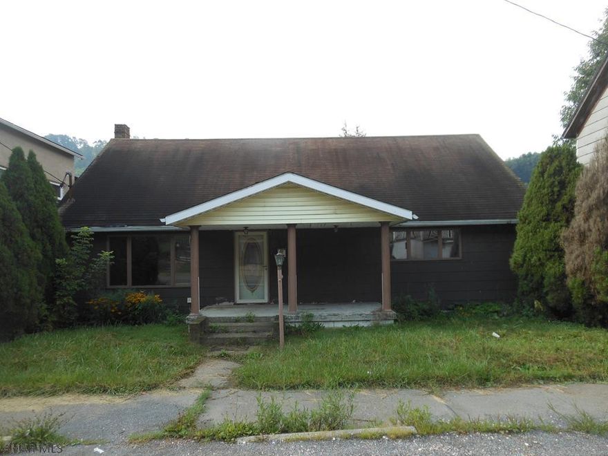 This is a 1.5 story home in Northern Cambria. This home features on the main floor a living room, eat in kitchen, full bath and two bedrooms. The second story has two bedrooms and a bath. The basement is very large with a walkout and could be finished as potential living space. There is an elevated deck in the rear of the home off of the eat in kitchen. There is a hookup for a bath to be installed in the basement as well. This is a handyman special with potential.