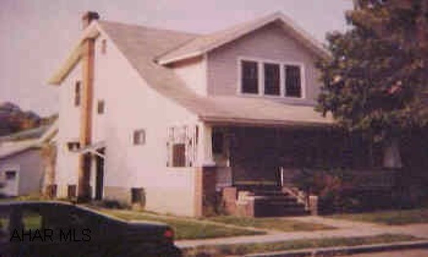 charming large home w/ hardwood floors, natural woodwork, new carpet, vinyl siding, large lot