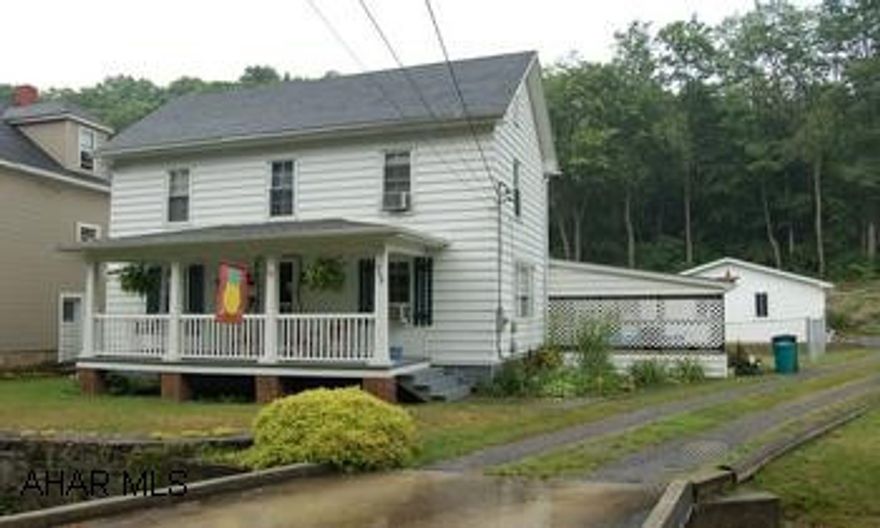 Great starter home, hardwood floors, nice kitchen, new carpet, new paint, fenced yard, large garage, above pool negotiable. Newly renovated home w/ modern kitchen, hardwood floors, thermopane windows, new carpet upstairs, fresh paint, new half bath on first floor, window a/c stay, well insulated, excellent condition. Move right in!