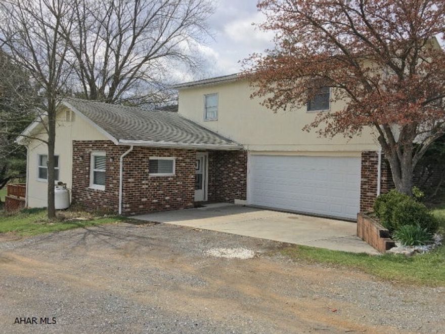 You are home. Lovely home that has had many updates throughout the years. Updated kitchen with beautiful oak cabinets and skylight. Updated lighting in dining and foyer. Gas fireplace in living room, wood stove in family room, all situated on a 1.38 acre lot. One year home warranty included.