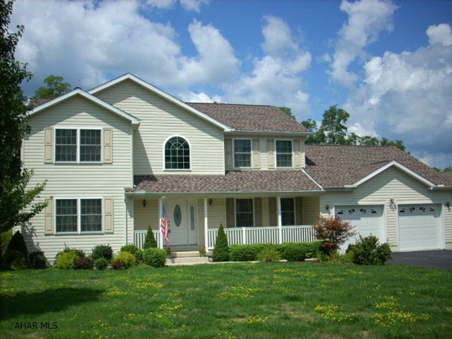 Priced to sell! Spacious 4 bedroom with 1st floor master bedroom. 2 full baths & 2 half baths. Hardwood floors. 2 story foyer with open loft for additional living space. 2nd floor laundry. Large 2 car garage.Rear deck. Bellwood-Antis Schools.