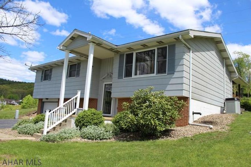 3 bedroom, 2 bathroom home in Hollidaysburg School District. This home has 2 bathrooms completely remodeled (1 w a cedar closet) dining room w/ hardwood floors that opens out to a beautiful covered deck, nice size bedrooms, family room w/ pellet stove for chilly winter (and May) days and wet bar, fire pit and a place all ready for a garden. The yard has fruit trees, blueberry bushes and grapevines. This home sit on over half an acre on a quiet street. Contact me for more information.