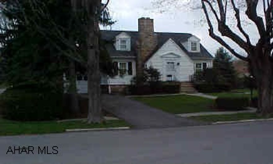 An adorable cape cod, double lot, flood insurance req. Freshly painted, new furnace, new windows, neat as a pin, new carpet, new blacktop (driveway), hardwood under carpet.