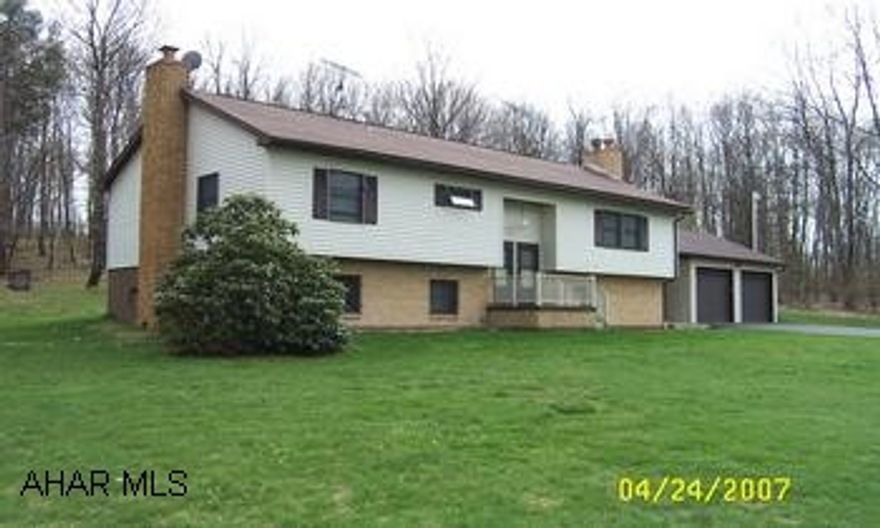 Split-entry home with two finished floors. 1485 square feet per floor. Two kitchens, 3 full baths, 4 bedrooms.  All in very good condition.