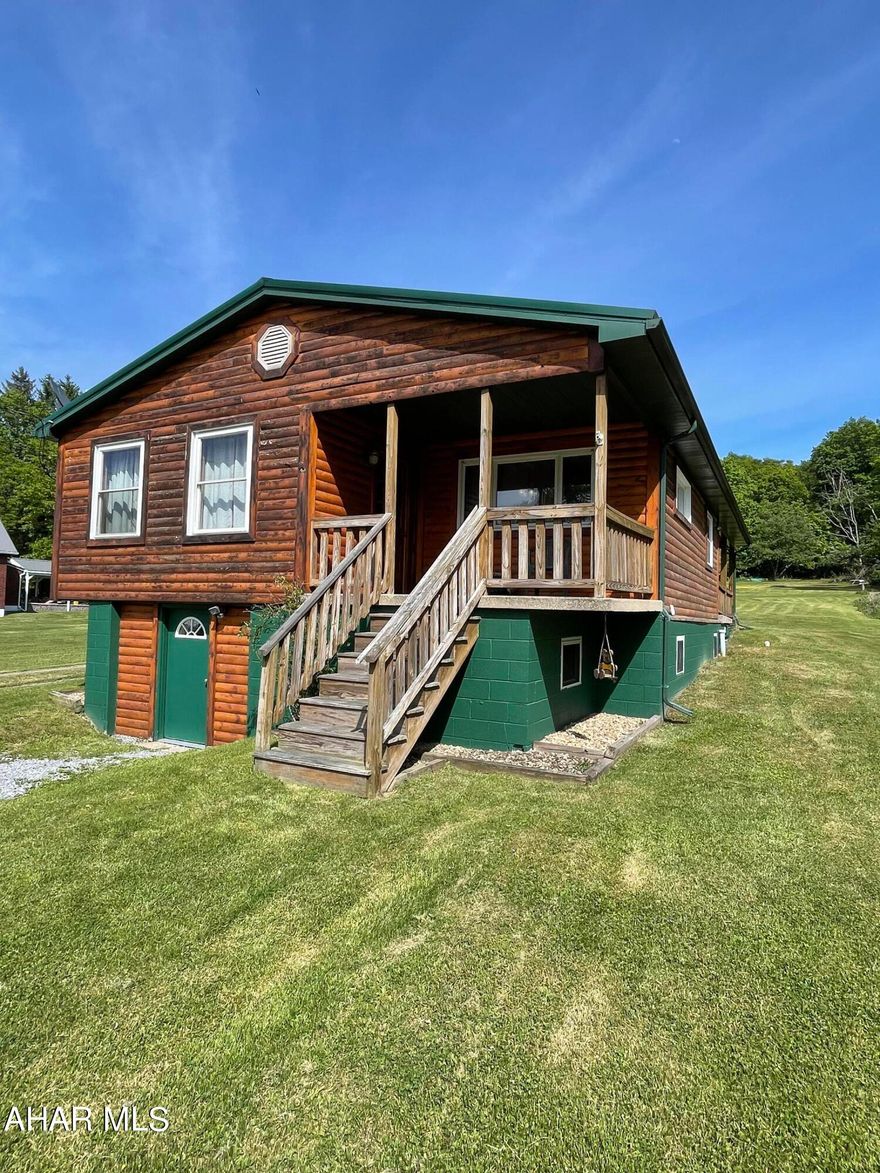 This house sitting on a half acre parcel in Central Cambria school district has many updated features and will make a great starter home.  2nice sized bedrooms have great closet space.  The spacious bathroom has a large walk in shower and a nice closet to store bath towels.  The eat in kitchen flows nicely into the living room.  There is an entry room with a large closet for storing all your coats and shoes.  New roof in 2020, newer windows, bath updated in 2019, newer hot water heater, plenty of storage in the basement!  Outside you will find an incredible covered deck great for entertaining family and friends all year long and a long yard with space for a garden if you chose.