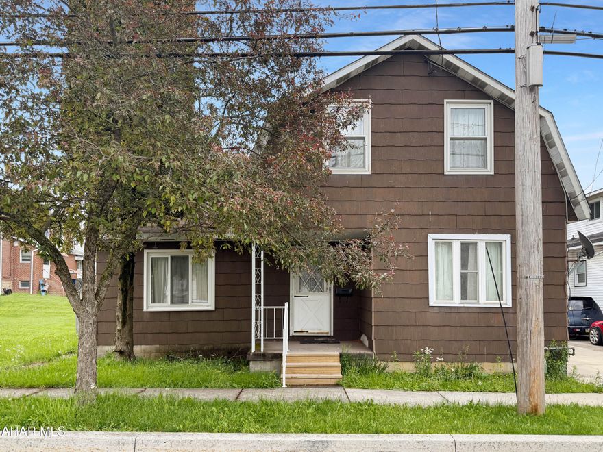 Welcome to 214 N Marian Street in the heart of the Ebensburg Borough! This estate property is full of potential and ready for the right buyer to bring it back to life. While the home does need TLC and updating, it offers solid space, character, and endless possibilities for an owner occupant, investor, or renovation project. The main floor features a spacious living room, formal dining room, large kitchen, cozy family room, and an additional bonus room that could easily serve as a first floor bedroom, office, or flex space. Upstairs you will find 3 nicely sized bedrooms and a full bathroom. The basement is unfinished but provides excellent storage space and houses the home's mechanicals. Outside, enjoy a covered front porch, rear covered patio, spacious yard, and more. Property is being sold in 'AS-IS' condition as part of an estate sale. Buyer will be responsible for any sewer testing or related requirements. Please note that all utilities are currently turned off except for electric. Call today for more information or to schedule your tour!