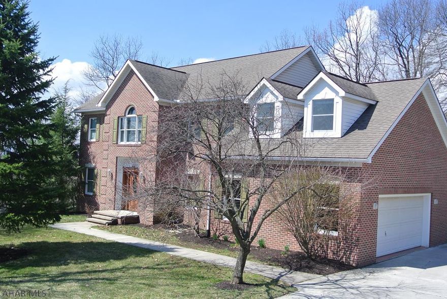 What a find!!   This very stately colonial style home in the Altoona School District offers it enormous classy stature in the very desirable area of Sylvan East!!!   With it's very spacious rooms, you will have plenty of space for your growing family.  Although the one of the current 4 bedrooms is considered captive, there is yet another option for a possible 4th (or 5th) bedroom with this homes original design.(call for details).  This magnificent home also features hardwood flooring, ceramic tile, 1st floor laundry, formal dining , breakfast nook, and family room with french doors to a very large private deck, new kitchen solid surface countertops with a bar, new carpet, new light fixtures, newer stainless steel appliances, and its been completely painted throughout!