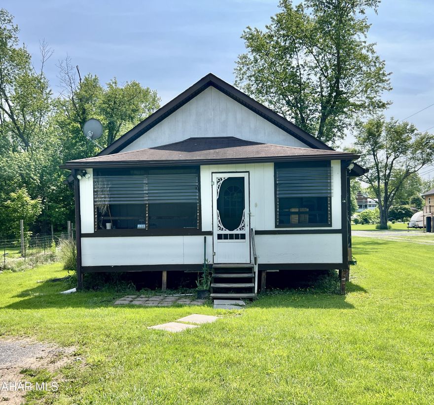 Just in time for summer! Check out this cottage located in Camp Sunshine, with access to Dunning's Creek. The cottage offers 2 bedrooms plus a loft, 1 bath, living room, kitchen, and a screened-in porch. Would make a great place to kickback and relax with family and friends and enjoy the outdoors.