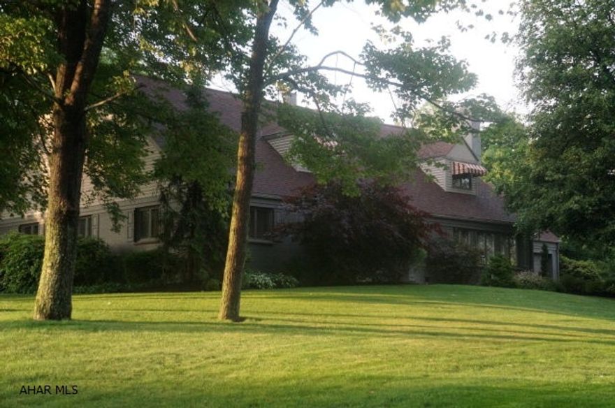 Quality and beauty is what you will find everywhere in this 2 story brick home with over 1 acre on the corner of Blairmont Terrace and Sylvan Dr. Overlooking Sylvan Hills golf course. Large living room with wood fireplace, large dining room with built in China Closet and book case. Updated kitchen with butler's pantry. Family room/4th bedroom, office and updated bath all on 1st floor. 2nd floor has large master bedroom with private bath & walk in closet. Plus two more bedrooms and a bath. You can relax on the huge 18X25 screened in slate floor patio or on the uncovered paver patio after or before your swim in the 20X44 built in pool. You will love how beautifully it is landscaped with zoned Irrigation system, all with quality and beauty anywhere you look.  Great popular location.