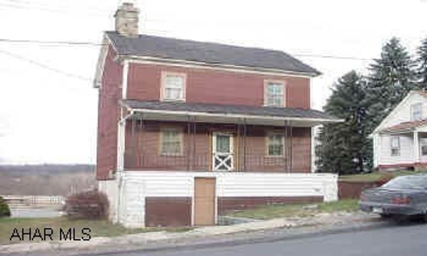 Historically oldest home in Manns Choice. covered log home Well Built log home original fireplace hardwood floor in basement