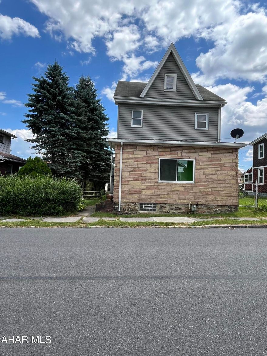 Needs interior work - some drywall repairs and flooring. Fantastic home to do a reno loan!! Offers first floor 3/4 bath. 2 car garage and additional off street parking.
