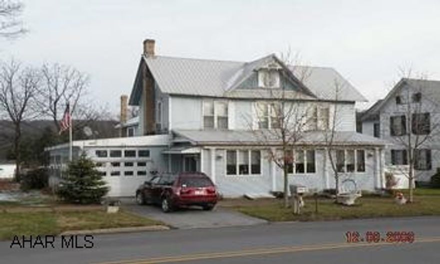 This Victorian style home offers large, spacious rooms, beautiful bath w/ jacuzzi tub on first floor & large heated sunroom.