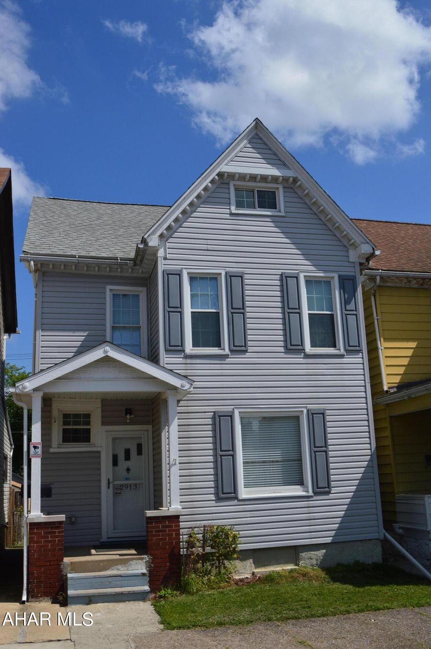 This updated two-story home is not only spacious but has been well taken care. The house boasts 2-3 bedrooms (the 3rd room in the attic is perfect for a bedroom), 1 large bathroom, and laundry on 2nd floor close to the bedrooms. The many updates include new roof, new hot water tank , newly installed boiler heating system, and new Mini Splits through the home with heat & A/C. Fenced in yard and off street parking.