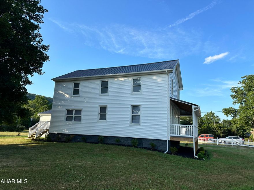 Nestled on a picturesque one-acre lot just outside of town, this beautifully newly renovated home boasts three spacious bedrooms and two and a half baths. The covered wrap around porch enhances the charm and curb appeal of this desirable property. Inside you will find an updated generously-sized eat-in kitchen with pantry for ample storage; perfect for family gatherings. The master bedroom features an en-suite and walk-in closet. 2nd floor also features a laundry room for extra convenience. The large, flat yard provides plenty of space for outdoor activities and a 24X35 2 car garage and extra parking for guests.