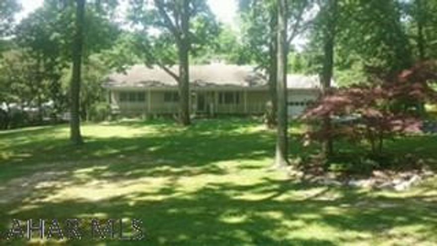 Private peaceful setting-lovely one story living-Great Room w/ Dining Area, Lg. Eat-in Kitchen w/ Oak cabinets, all appliances included. Wood burning fireplace in Great room. Walk out to deck and private back yard. 3 bedrooms, Master w/ private bath & full bath. Walk up attic. Basement w/ sump pump. Berber carpet throughout