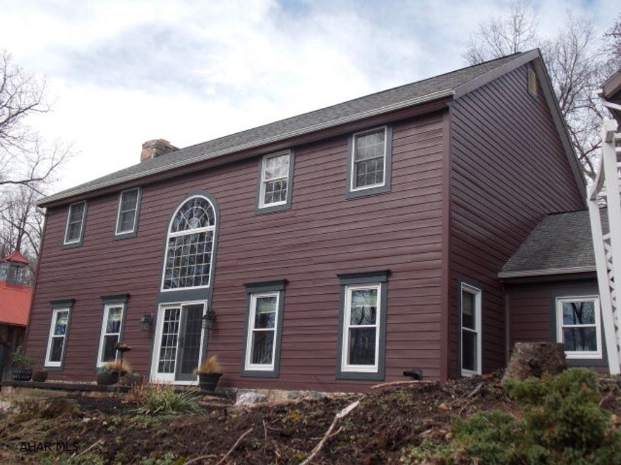 Lovely 4BR/4BA home on 13.38 acres. Country living but close to town. The open floor plan with lg. rooms is conducive to entertaining lg. or small groups. The Kitchen has granite and quartz counter tops and flows into the breakfast room or Living room where guests can sit by the fire. Each bedroom is lg and there is an apt. above the garage with LR, Kit, DR, BR + BA. Great space for visitors, older children, in-laws or rent it out. The outdoor space is perfect too with a screened in porch, gazebo, patio and plenty of room to run + play. This summer's picnics will be at your house. This home offers so much to the active family. It must be seen to be appreciated. Come + enjoy the peace + quiet.