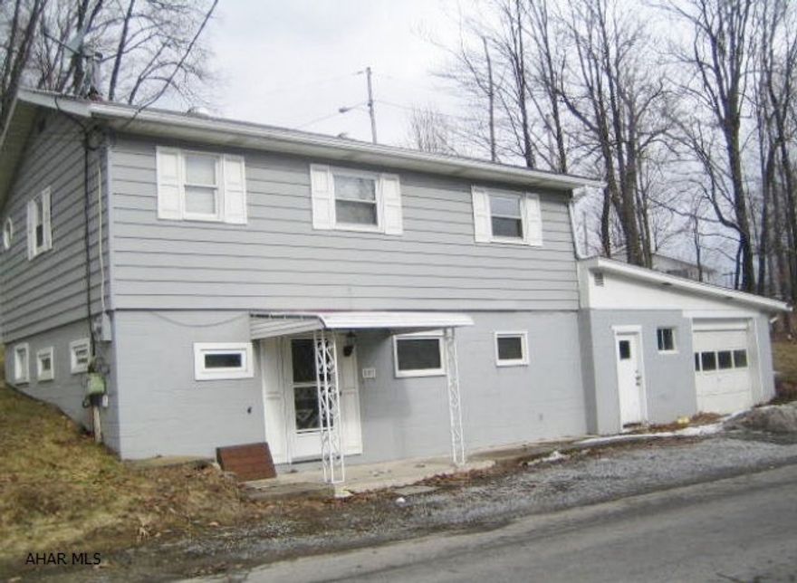 Ebensburg Raised Ranch home. Some nice updates, but needs TLC. Large living room, kitchen with large dining area, attached garage and nice rear deck. Being sold AS-IS. Seller will make no repairs.