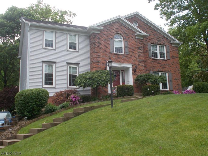 If you ever wanted to live in Elmwood, now is your chance.  Lovely 4 BR, 2.5 BA . large secluded landscaped  lot with fenced in backyard, updated kitchen with corian counters and ceramic tile. Enjoy the woods and privacy in your 3 season room.  This property is priced to sell.