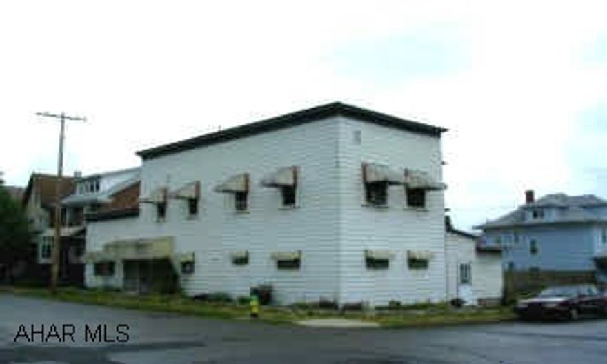 2 UNIT DUPLEX WITH NEWER FURNACE, WIRING AND WINDOWS. LARGE CORNER DUPLEX IN JUNIATA.  ALUMINUM SIDING, SOME NEW WINDOWS, LARGE 1ST FLR UNIT.  NEWER MECHANICS.  PRICED TO SELL.