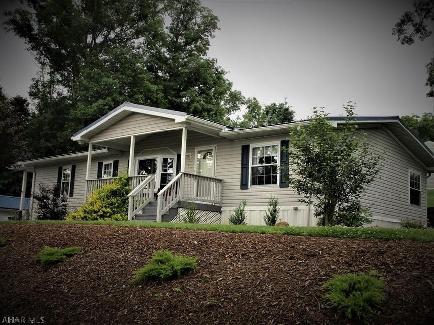 Come on in!  Take your shoes off and stay awhile... you will not want to miss this home!  Situated on .39 of an acre, this 1999 Fleetwood is sure to please!  Large open spaces including 2 sunrooms, huge kitchen and living room! Spacious bedrooms with lots of windows to let the natural light in.  2 bathrooms including a giant master bathroom with a relaxing tub and separate shower.  Enjoy all the entertaining area outside all around the home including the beautiful patio and cozy front porch.  Nice yard space and low maintenance. Parking for 2 inside your 2 bay garage plus a half garage in back.  Storage shed for all your outdoor gardening tools. Close to downtown Bedford approximate 1.9 miles, 2.5 miles to PA Turnpike, 35 miles to Altoona and 29 miles to Cumberland.