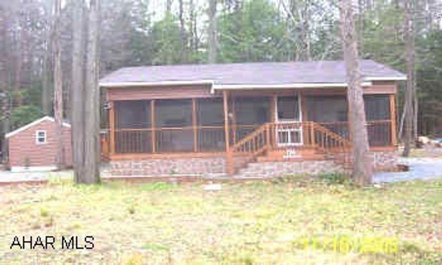 Mint condition 2002 fiberglass Cedar Creek camper, 33 ft. long, on large corner lot in Glendale Yearound. Has all the bells and whistles, includes 12x30 screened porch and 12x16 workshop & heated bunkroom. Would make a great hunting camp or vacation spot, close to hunting, fishing, and hiking. Also contains a 30 amp. guest camper electrical facilities.