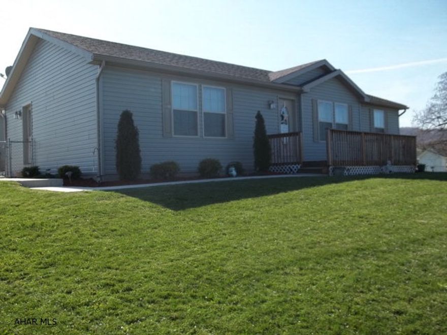 Better than brand new.  Large fenced in yard, energy efficient, heat pump, family friendly layout or great for empty nesters with first floor laundry.  3 bedrooms, 2 baths.  INCREDIBLE UTILITY COSTS  -  Close to I99 exit at Roaring Spring and to the new Walmart.Brand new Spring Cove Elementary School.SHOULD QUALIFY FOR RURAL HOUSING LOAN  For the empty nester looking for one-floor living, this is it.  Laundry off kitchen on main level of home.