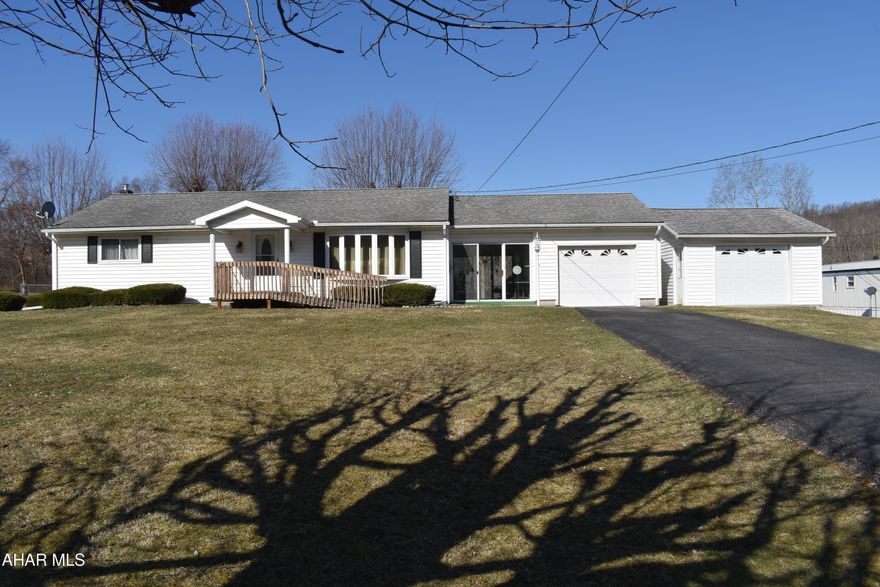 Quaint one story home located minutes from Blue Knob All Season Resort.  This home features an eat-in-kitchen, newer windows, remodeled bathroom, first floor laundry, large unfinished basement, ample garage space, and a cozy breezeway to keep you warm in the winter and cool in the summer.