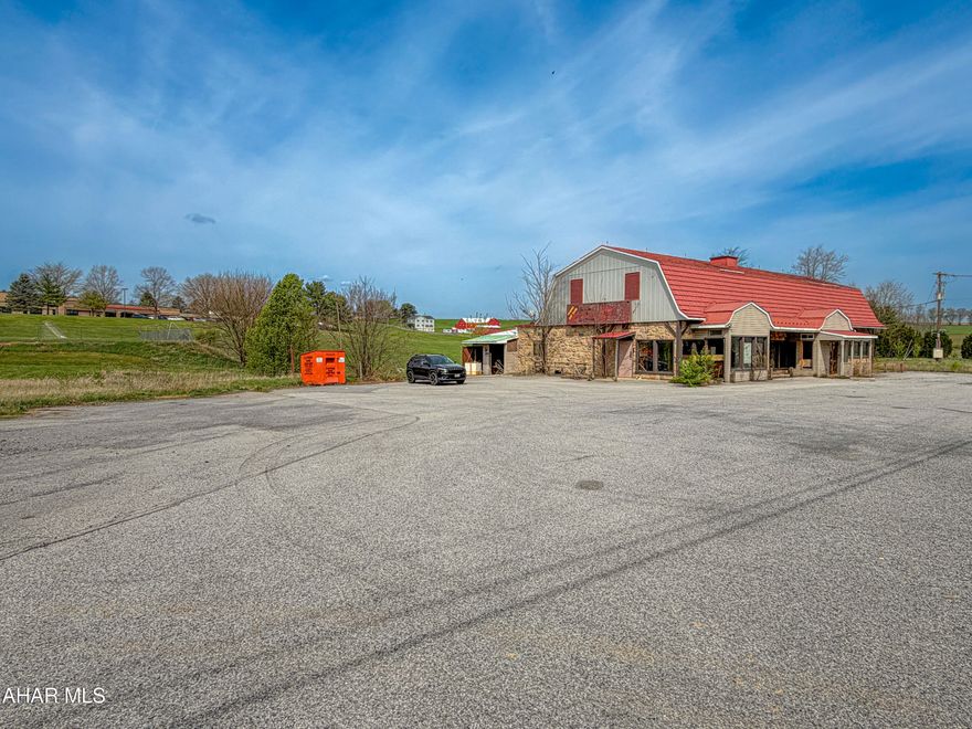 Prime commercial site containing 1.72 acres with excellent visibility and exposure. New NPDES and highway occupancy permit have already been secured. Endless opportunities with this property, it could be used professional/medical offices, restaurant, or multiple other retail uses. Site is level, rests in front of Northern Bedford Schools, and has approximately 500' of public road frontage. The current building on site is in poor condition, and the owner's intention was to remove it.