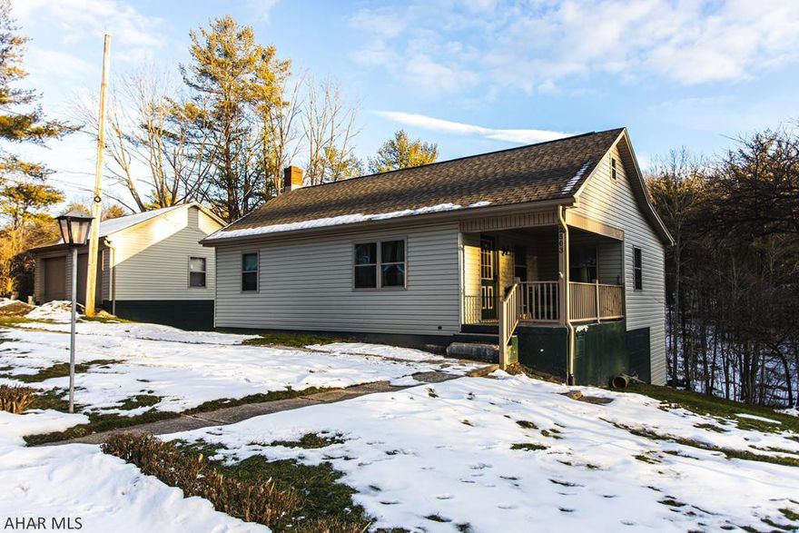 Cozy 2 bedroom, 2 bath house on .84 beautiful acres. Underground electric dog fence, workshop area in basement, 2 car detached garage. Partially finished basement. Eating area in kitchen with built in seating & storage. Don't miss the opportunity to make this charming house your new home!
