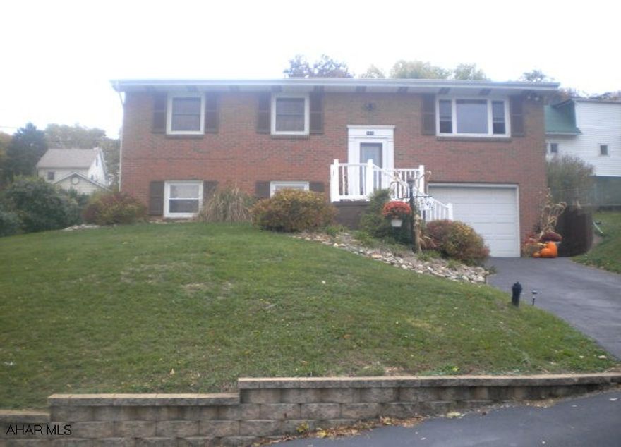 Brick home in great neighborhood! This 3 bedroom, 1.75 bath home features a finished family room in basement - great for entertaining; new, updated, oak kitchen, & fenced backyard. Beautiful views of the mountains!