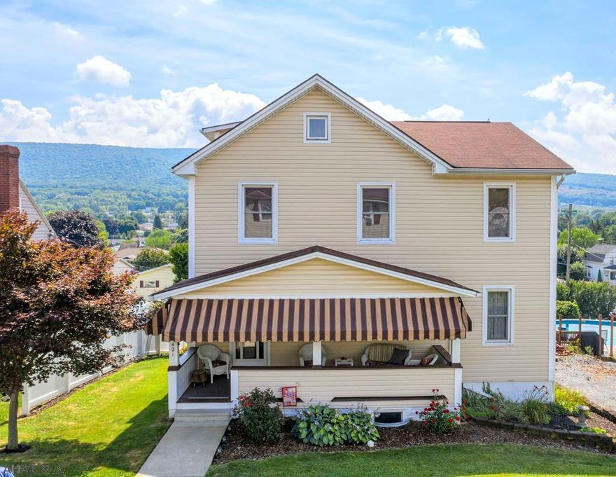 Beautifully updated 3 bedroom, 3 bath home in Altoona with spectacular views & 3 car garage! Enjoy the raised, 2 level deck showcasing breathtaking views of the mountains as you sip your morning coffee or grill dinner out. The covered front porch is also the perfect place to unwind. Wicker furniture included! Inside, you'll find custom wood work throughout, updated flooring & lots of character! The first floor features high ceilings, custom cabinets in the kitchen & a farmhouse style, deep sink. The office offers custom built-ins & a large desk. Living room is wired for sound. Upstairs, discover the master suite w/walk in closet & dressing room connected to a Jack and Jill bath. Another full bath central vac on all floors. Must see! (Located in Pleasant Valley Elementary area)