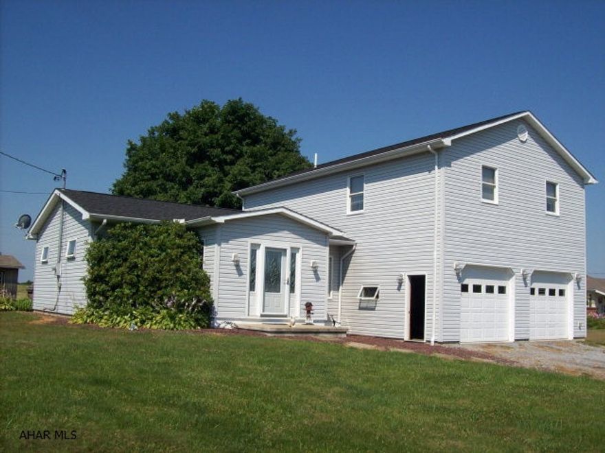 Spacious split level on 80' x 200' lot. Vinyl sideed 3 bedroom, 2.5 bath, first floor laundry, entire second floor is a gorgeous master bedroom suite with master bath and jacuzzi whirlpool tub, walk-in closets, 2 car integral garage with one car detached garage, this is a lovely home in move-in condition!