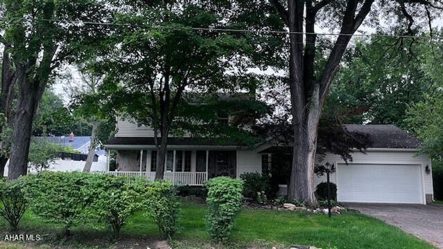 A classic two story home in the suburbs of Hollidaysburg (Frankstown township), Mature Shade trees and landscaping provide for the privacy you desire, yet  convienant to all local amenities.  
Stepping into the foyer you immediately feel the richness of beautiful hardwood throughout most of the home.  The kitchen boasts new appliances, hardware and an abundance of cabinetry including a huge pantry.  Off of the elegant dining room is a brand new composite deck, The large formal living room provides stunning scenery from the elegant windows.  Rounding out the first floor is a family room off the kitchen and entryway with wood burning fireplace, a half bath and another great outdoor space--a screened in porch.
Follow the natural hardwood upstairs to all 3 nicely sized bedrooms and the 2 full baths.  Both full newly remodeled bathrooms are ample in size and waiting for your touches.  
Finally, find a brand new tastefully decorated Recreation Room in the basement, new furnance and air conditioning, new water heater and more....