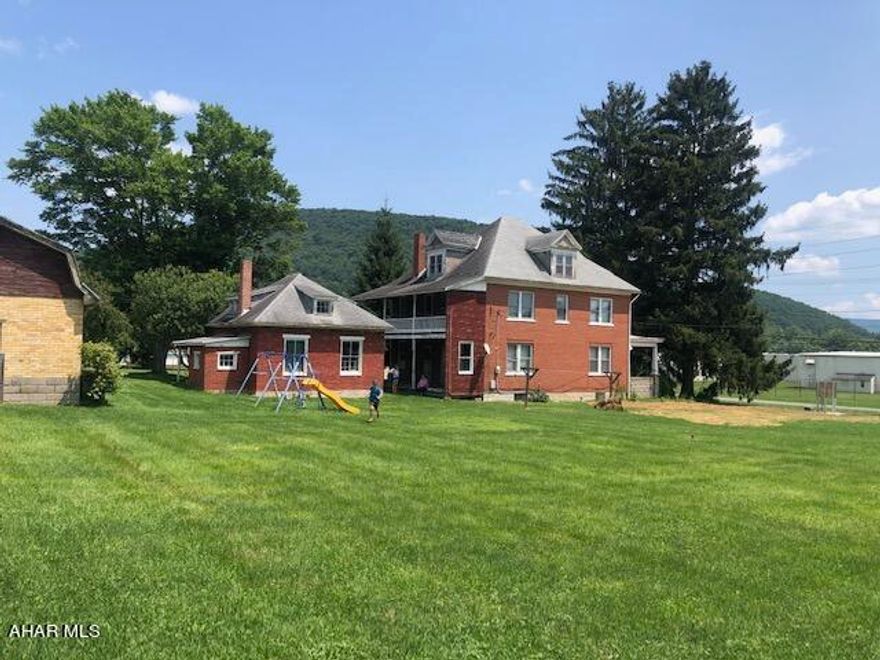 Early 1900's brick 2 story located just outside of historic Bedford PA.   Original woodwork throughout, numerous outbuildings.  200 amp service and sewer line has been brought into current compliance.   With some TLC this house could be returned to its glory years.