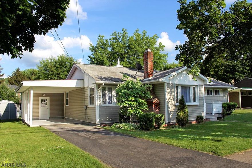 Enjoy 1 story living in this beautifully updated home in Hollidaysburg!  The kitchen offers plenty of natural light from both windows and a sun tunnel.  The kitchen features new granite countertops and flooring, as well as, included appliances.  The dining area is open to the living area and boasts soft neutral colors and a restored gas-fired fireplace.  The home has three bedrooms all with freshly refinished hardwood floors.  The master bedroom is large and has an ensuite bath.  There is also an updated full bath adjacent to the other bedrooms.  There is even a separate laundry room with included washer and dryer.  Outside you will find a covered patio area perfect to grill or relax.  A carport shed, and storage area rounds out this wonderful home!