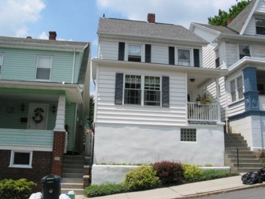 Close to campus and hospital. Very well maintained home. Owner to replace elec. fuse panel with  circuit breakers. 3rd BR on 3rd floor heated. Newer roof. Garage off alley. Fenced back yard. Newer water heater.