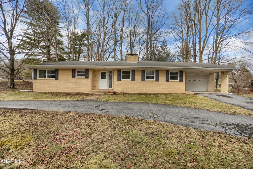 Location, location, location!!! This beautiful one story ranch home is what you have been waiting for! All new carpet and freshly painted walls. The master bedroom has it's own full bathroom. The living room features a fireplace. It has a large back deck for entertaining your family and friends on a warm summer evening. Oversized front yard. This home is located 1 minute from the community park and pool, 2 minutes from the local hospital, 20 minutes from Altoona, and 25 minutes from State College. Come see this wonderful home for yourself, you won't be disappointed!