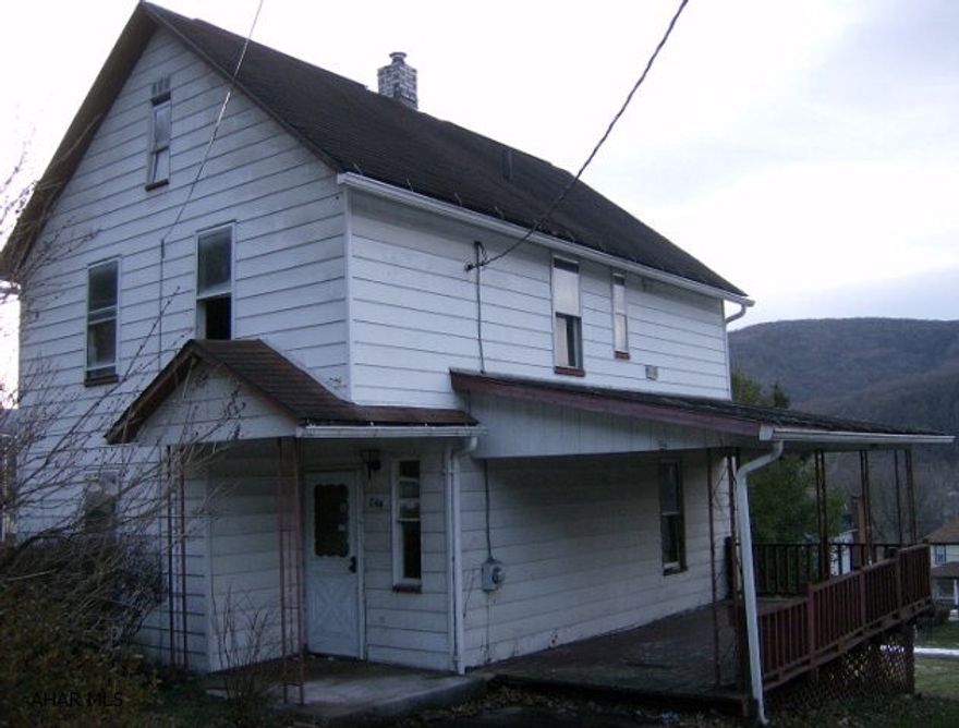 2 story 4 BR 1 1/2 bath home in Bolivar, Ligonier Valley schools. Handy-man special in great neighborhood.