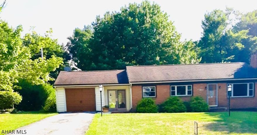 Move right in to this well maintained ranch home in Penn Cambria Schools. Well equipped kitchen with oak cabinetry and plenty of room for dining table. Feature wall  with fireplace in the bright living room. Two very comfortable bedrooms with plenty of closet space. Full bath with updates and storage. Entertain in the lower level family room with bar and room for ping pong or pool table. 1 car attached garage that enters into the breezeway. Covered patio with mature trees in the private back yard. Call to see this beauty!!